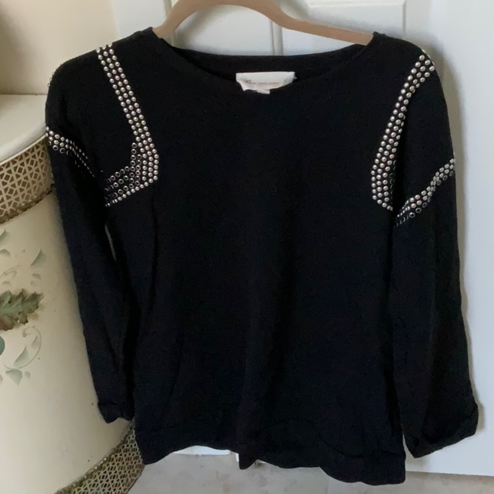 Black sweatshirt with silver studs on shoulders
